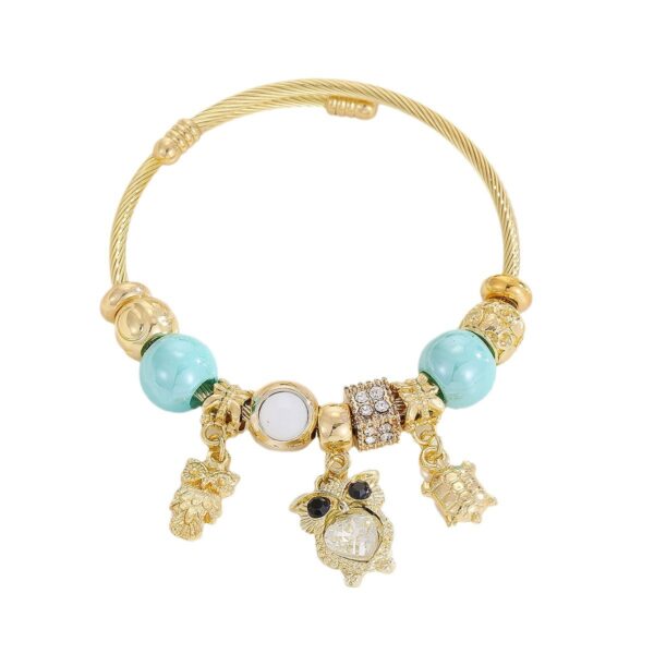 Wholesale European and American Hot Pandora Gold Stainless Steel Bracelet Women's Diamond-encrusted Fishtail Dolphin Alloy Pendant Adjustable Bracelet