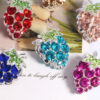 Wholesale DIY colorful grape-shaped keychain with full rhinestones and straight holes for easy stringing.