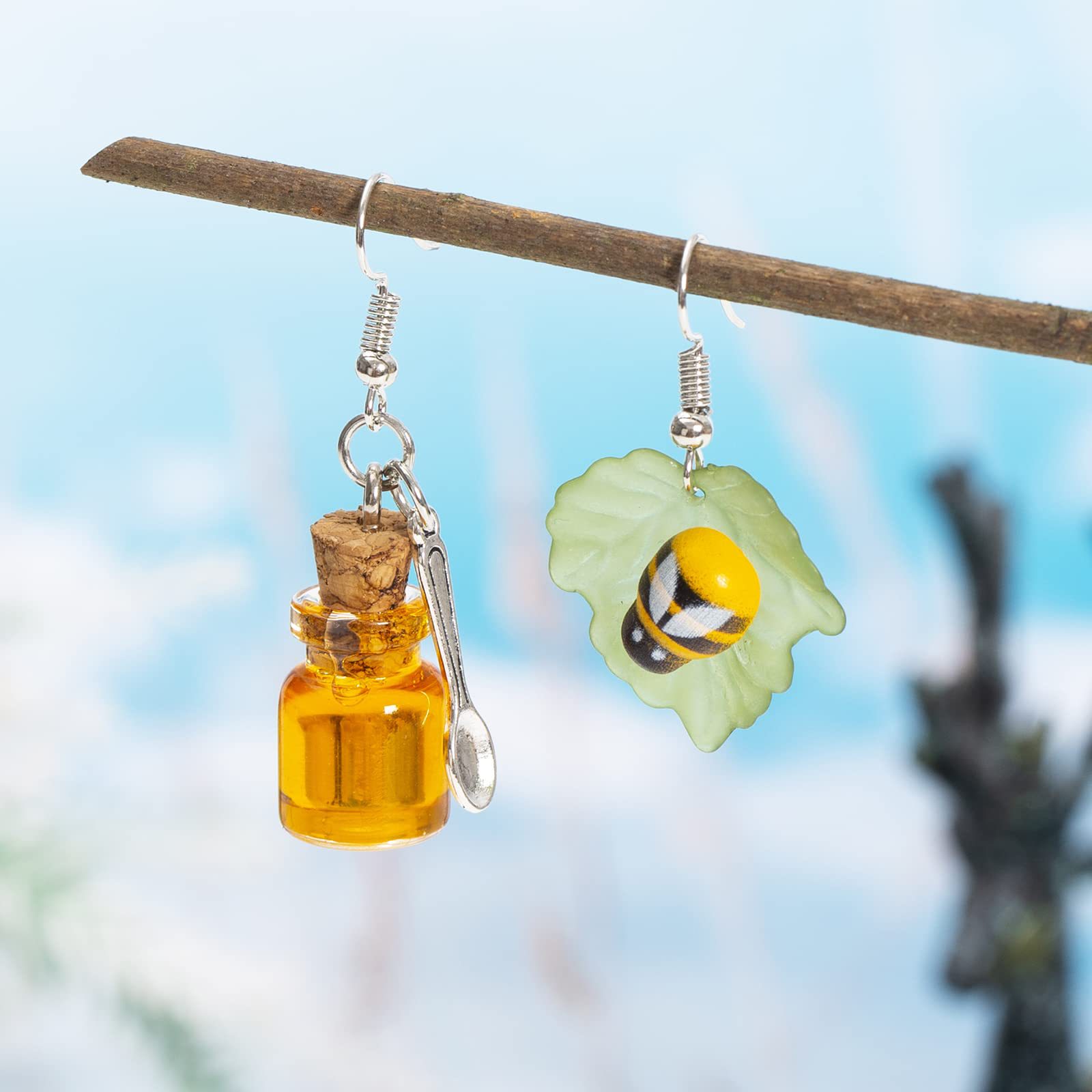 Wholesale Cross-border new buzzing bee earrings Japanese and Korean fashion creative simulation honey transparent bottle earrings