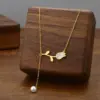 Wholesale [Whole Body Titanium Steel] Tulip Pearl Pendant Necklace Light Luxury Classic Style Necklace