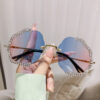 oly-ee06aecc638844925e83be73f9b95ffa Wholesale lygon Shaped Diamond Trimmed Frameless Flower Wave Sunglasses Retro Sunglasses