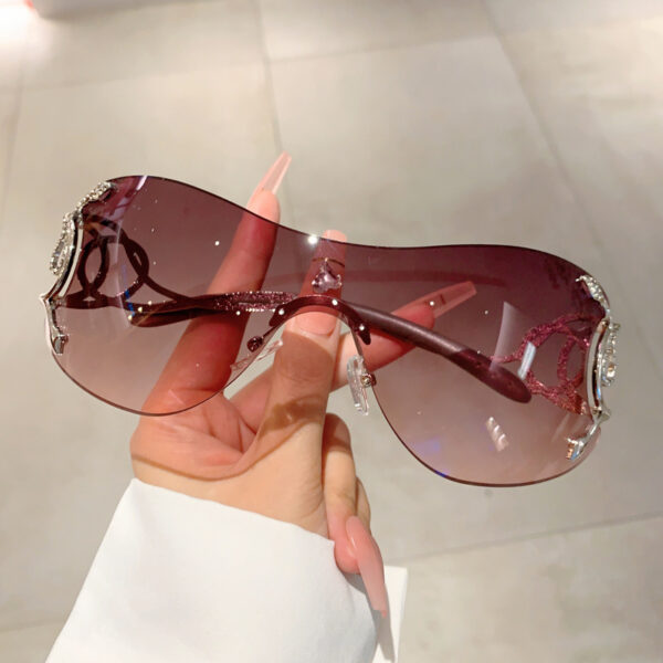 Wholesale Cross-border new personalized fashion frameless one-piece snake glasses legs sunglasses technology Y2K funny sunglasses