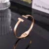 Wholesale 304 Stainless Steel Geometric Solid Color PVD Coated Real Gold Plated Modern Style British Style Waterproof Non Tarnish Plating Rose Gold Gold Silver Bangle