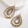 oly-ee9179de5033eb9c8733d53db4f710ba Wholesale Western style oval exaerated cross earrings with white turquoise