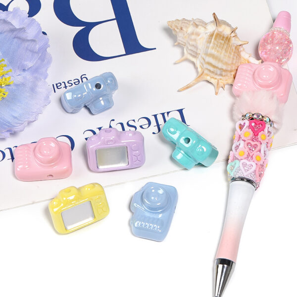 Wholesale Acrylic cream colored camera bead