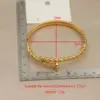 Wholesale 304 Stainless Steel Twist Ion Plating (IP) Real Gold Plated Simple Style Classic Style Waterproof Non Tarnish Asymmetrical Buckle Gold Bangle