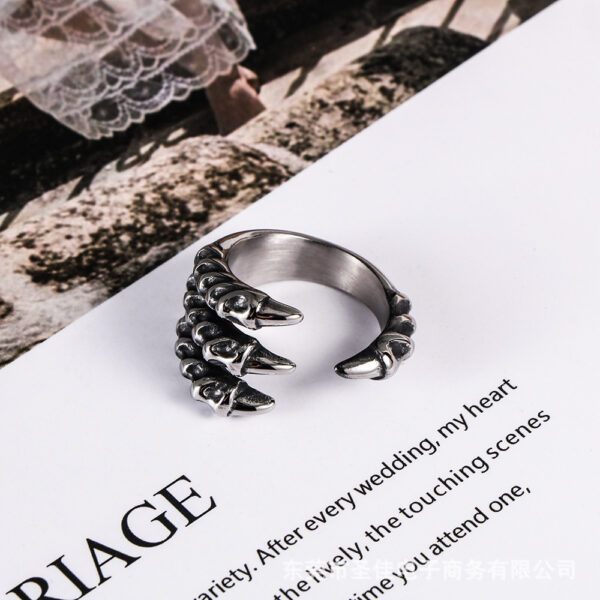 oly-ef0755eb4878e3e9e770af0cc6e3ffec Wholesale retro agon claw titanium steel ring personality men's sharp open ring casting jewelry SA804