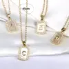 Wholesale Copper 18K Gold Plated Simple Style Classic Style Plating Inlay Letter Shell Pendant Necklace