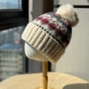 Wholesale Christmas wool hat for women, warm and cute winter pom-pom ear flap hat