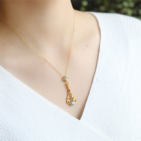 Wholesale Hot Selling Lao Thailand Saujin Inlaid Turquoise South Red Personalized Pipa Pendant Harp Pendant Temperament Clavicle Chain