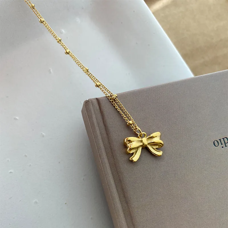 Wholesale PVD Coated Real Gold Plated 18K Gold Bow Knot 304 Stainless Steel IG Style Waterproof Non Tarnish 304 Stainless Steel Necklace