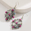 Wholesale Retro-style turquoise inlaid geometric cross earrings for women