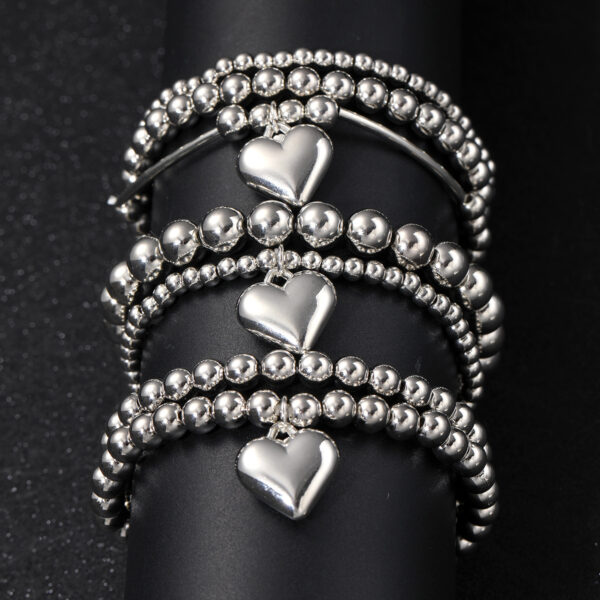 Wholesale Europe and the United States cross-border new fully managed love pendant beaded bracelet simple folding wind elastic bracelet bracelet