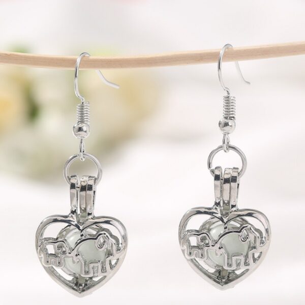 Wholesale Simple Fashion Mother's Day Animal Elephant Elephant Love Hollow Luminous Earrings Earrings European and American Jewelry