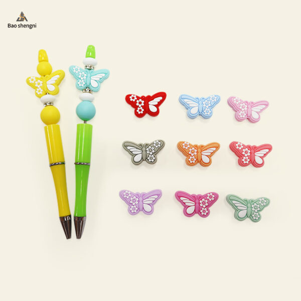 oly-f24e676df997dc535dbce480cf2f1b2a Wholesale In stock silicone beads exy butterfly loose beads baby teether anti-op chain aessories DIY beads