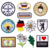 oly-f25a9d9e0e076f0d51cffda852b8e930 Wholesale Flower cloth patch no-sew German epaulette patch