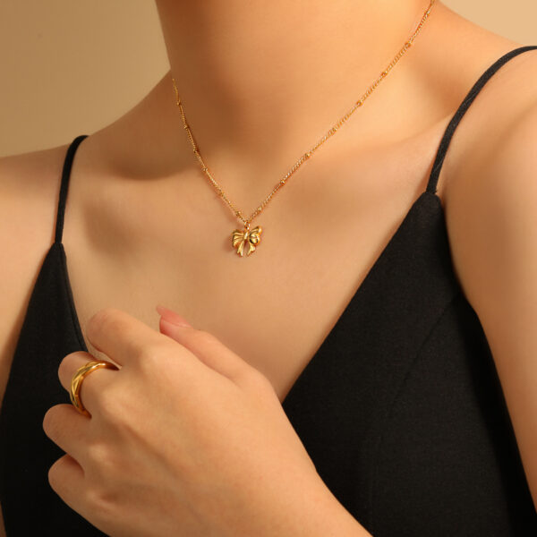 Wholesale Korean Style Ins Style Retro Minimalist Bow Necklace Women's Niche Cross-border Fashion Personalized Titanium Steel Bead Clavicle Chain