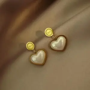 Golden-Stereo Love Heart Stud Earrings