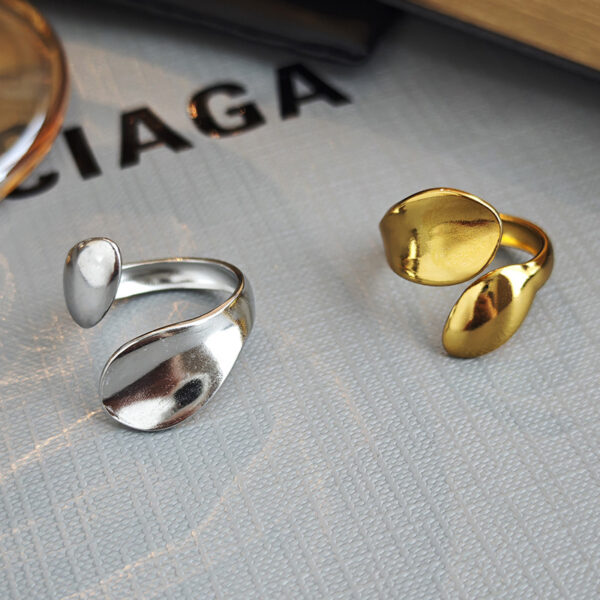 Wholesale Europe and the United States minimalist smooth asymmetric water drop fashion ring niche design simple temperament high sense open ring