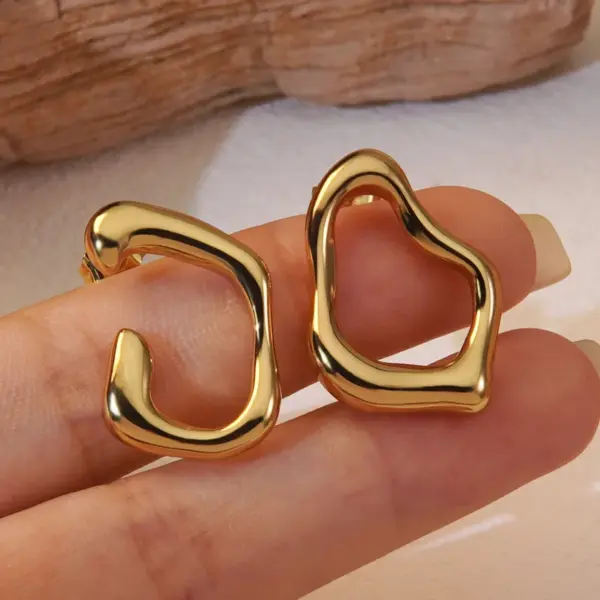 1 Pair Simple Style Classic Style Artistic Asymmetrical Irregular Hollow Out 304 Stainless Steel Imitation Gold Electroplating Ear Studs
