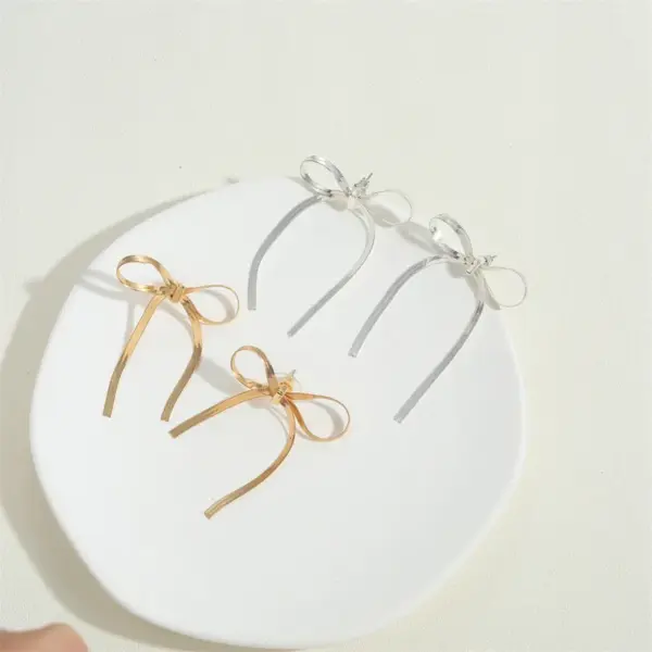 Wholesale 1 Pair Vintage Style Simple Style Commute Bow Knot Copper 14K Gold Plated Drop Earrings