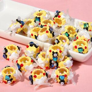 Yellow beads + yellow cream + bow + blue heart + red and white beads / One