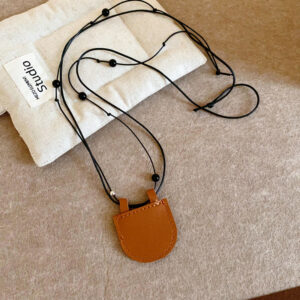 Brown-leather leather cord mini bag necklace