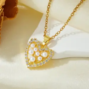 Gold Heart-shaped Hollow Pearl Necklace T021
