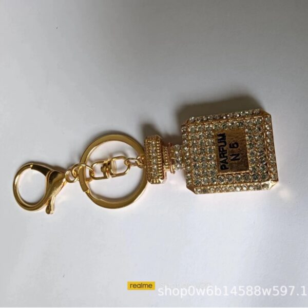 Wholesale Exquisite Crystal Perfume Bottle Small Gift Auto Accessories Rhinestone Keychain Creative Pendant Keychain Bag Pendant