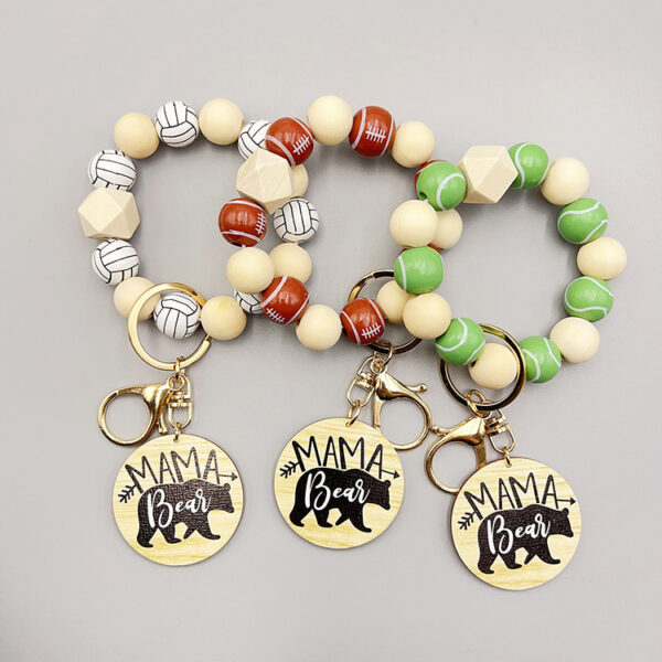 oly-f5320f11cd35ec3a1d581522742d67bd Wholesale sports style football basketball baseball and other wooden beads beaded polar bear
