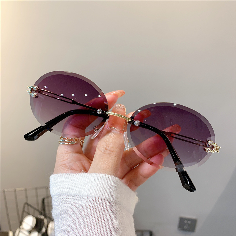 Wholesale Cross-Border New Sunglasses for Women, Oval Internet Celebrity Gradient Sunglasses, Rimless Edge-Cut Trendy Glasses
