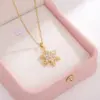 Wholesale 201 Stainless Steel Copper Plating Inlay Snowflake Zircon Pendant Necklace