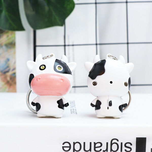 Wholesale Cartoon Sound Glowing Cow Car Keychain Cute Calf Car Pendant Student School Bag Pendant Couple Small