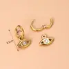 Wholesale 1 Pair Fashion Cross Devil'S Eye Heart Shape Butterfly Gold Plated 304 Stainless Steel Artificial Pearls Rhinestones Stainless Steel Earrings