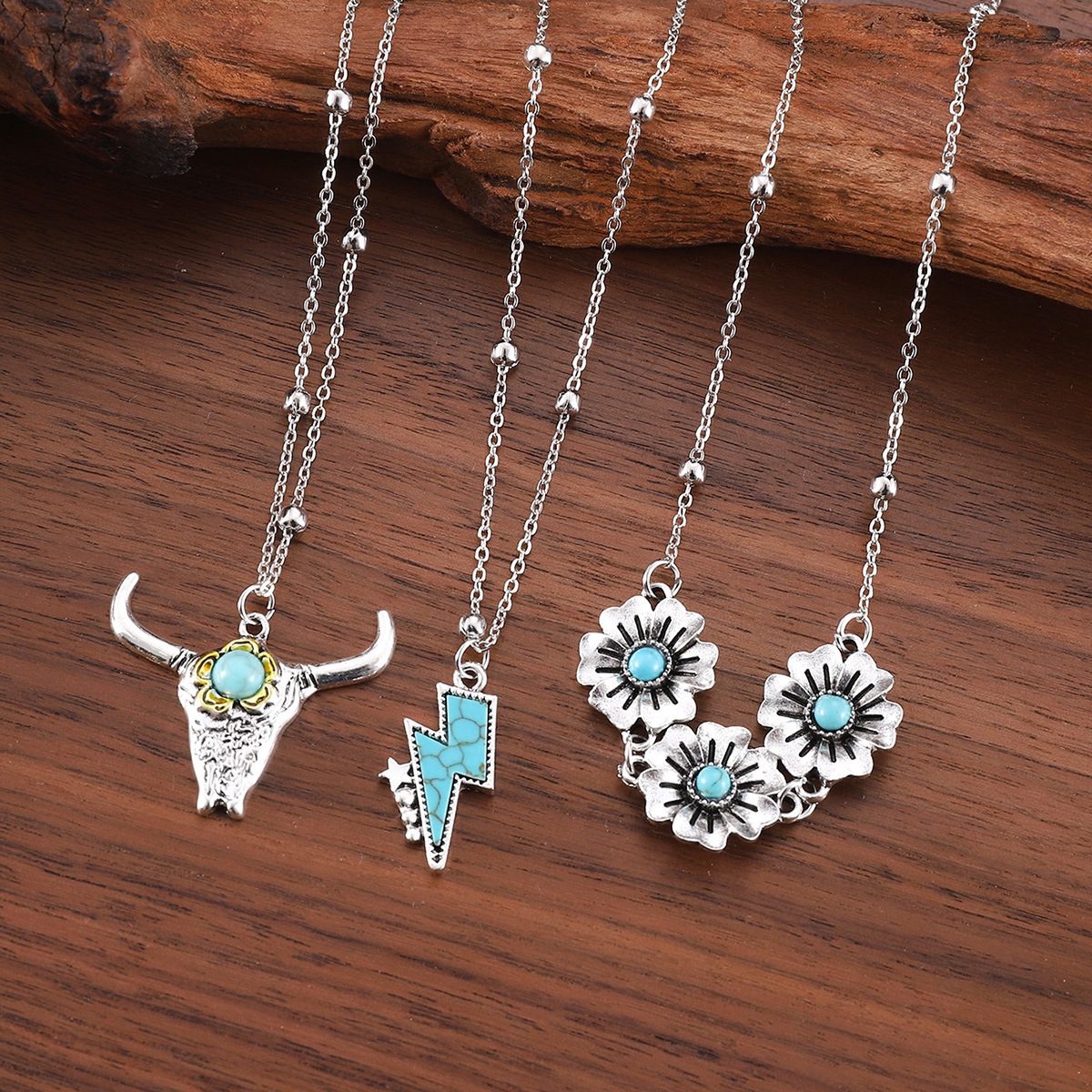 Wholesale Europe and the United States cross-border western Denim retro ethnic style imitation turquoise alloy cow's head war boots hat pendant neckla