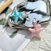 Wholesale Creative gradient shell starfish keychain pendant marine DIY acrylic glue drop cute student schoolbag pendant