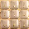 Wholesale Titanium Steel Fashion Plating Four Leaf Clover Heart Shape Artificial Pearls Zircon Pendant Necklace
