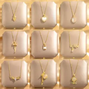 Wholesale Titanium Steel Fashion Plating Four Leaf Clover Heart Shape Artificial Pearls Zircon Pendant Necklace