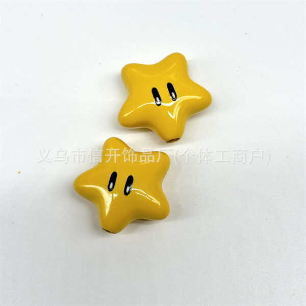 Wholesale Through-hole solid color facial expression print five-pointed star bead