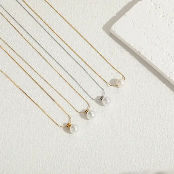 Wholesale 304 Stainless Steel ABS Pearl Solid Color PVD Coated Artificial Pearls Freshwater Pearl 14K Gold Plated Elegant Luxurious Classic Style Plating Inlay Box Chain Pendant Necklace