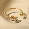 Wholesale PVD Coated Real Gold Plated 18K Gold Solid Color 201 Stainless Steel IG Style Simple Style Waterproof Non Tarnish Bangle