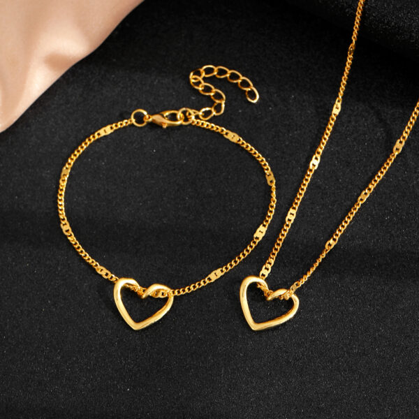 oly-fa3632e7088283149cce1c3c18733843 Wholesale women's hollow heart necklace bracelet