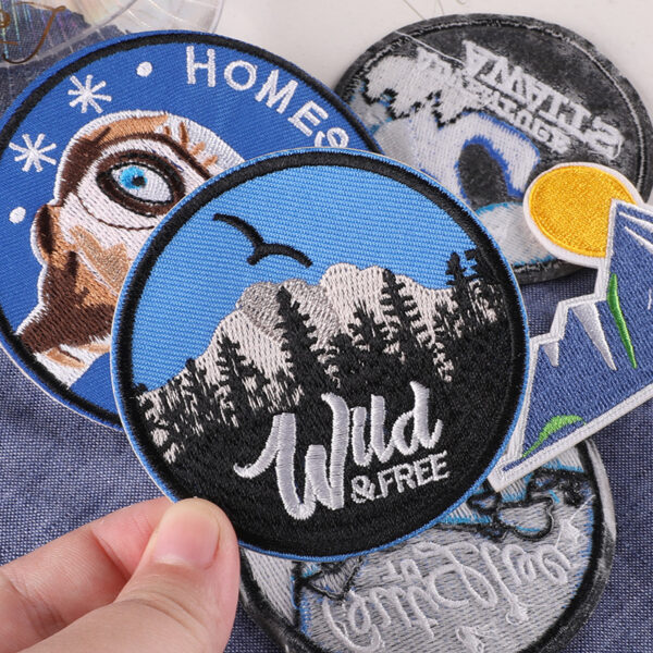 oly-fa3a757b790566d1a9f73ec9c121cd7c Wholesale Computer embroidery logo round iceberg forest badge logo clothing aessories badge cloth label adhesive patch embroidery cloth sticker