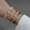 Wholesale PVD Coated Real Gold Plated Letter 304 Stainless Steel Nylon Copper Elegant Simple Style Classic Style Waterproof Non Tarnish Nylon Copper Bracelets