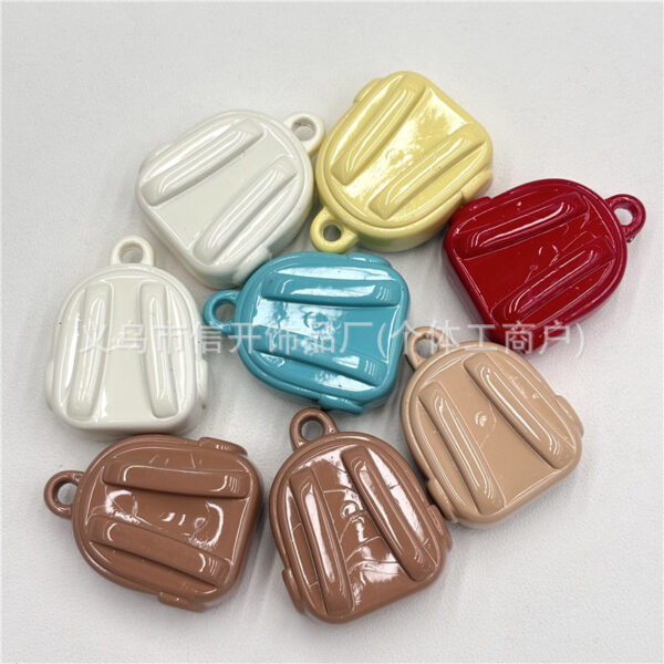 Wholesale Cartoon print beaded backpack with hanging holes