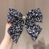 Wholesale Cross-border Explosions Leopard Element Fabric Bow Hairpin Bohemian Hair Accessories Women's Ponytail Spring Clip Hair