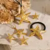 Wholesale 304 Stainless Steel Starfish PVD Coated 18K Real Gold Plated Real Gold Plated Vacation Simple Style Waterproof Non Tarnish Star Gold Rings