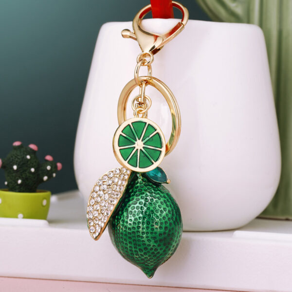 Wholesale New creative alloy rhinestone simulation fruit lemon car key chain bag pendant couple key chain gift