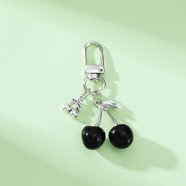 oly-fba8f9a967c89f208b6e6fb1ab2cf261 Wholesale Couple Keychain Resin Red Cherry Key Chain Alloy Accessories Cherry Pendant Student School Bag Pendant Accessories