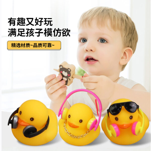 oly-fc89b2b21682f607e3fc894cd23deb02 Wholesale Cross-border water playing headphones yellow duck milk tea shop gifts cute voice play house toy duck factory